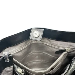 Satchel Hogan con tracolla
