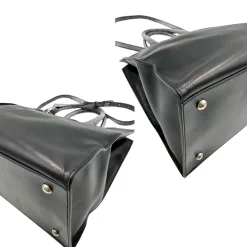 Satchel Hogan con tracolla