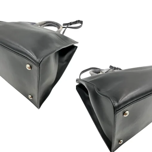 Satchel Hogan con tracolla
