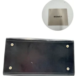 Satchel Hogan con tracolla